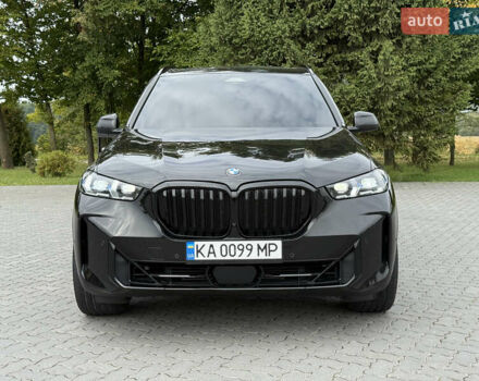Черный БМВ Х5, объемом двигателя 3 л и пробегом 75 тыс. км за 72800 $, фото 1 на Automoto.ua