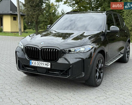 Черный БМВ Х5, объемом двигателя 3 л и пробегом 75 тыс. км за 72800 $, фото 2 на Automoto.ua