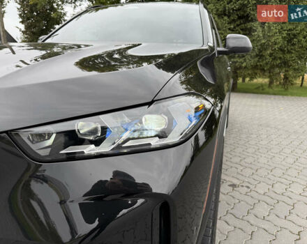 Черный БМВ Х5, объемом двигателя 3 л и пробегом 75 тыс. км за 72800 $, фото 3 на Automoto.ua
