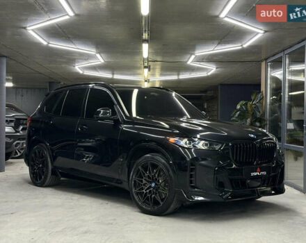 Черный БМВ Х5, объемом двигателя 3 л и пробегом 35 тыс. км за 72000 $, фото 1 на Automoto.ua