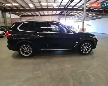 Черный БМВ Х5, объемом двигателя 3 л и пробегом 50 тыс. км за 42000 $, фото 1 на Automoto.ua