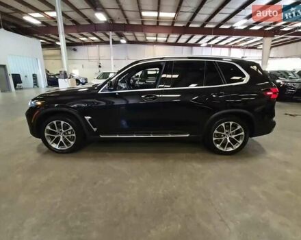 Черный БМВ Х5, объемом двигателя 3 л и пробегом 50 тыс. км за 42000 $, фото 2 на Automoto.ua