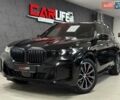 Черный БМВ Х5, объемом двигателя 2.99 л и пробегом 1 тыс. км за 104500 $, фото 1 на Automoto.ua
