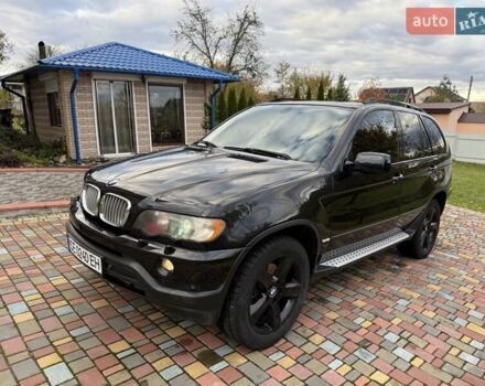 Черный БМВ Х5, объемом двигателя 4.4 л и пробегом 330 тыс. км за 6900 $, фото 1 на Automoto.ua
