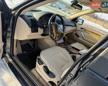 Черный БМВ Х5, объемом двигателя 3 л и пробегом 320 тыс. км за 6000 $, фото 1 на Automoto.ua