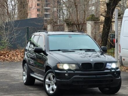 Черный БМВ Х5, объемом двигателя 4 л и пробегом 385 тыс. км за 10000 $, фото 1 на Automoto.ua
