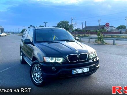 Черный БМВ Х5, объемом двигателя 3 л и пробегом 300 тыс. км за 8500 $, фото 1 на Automoto.ua
