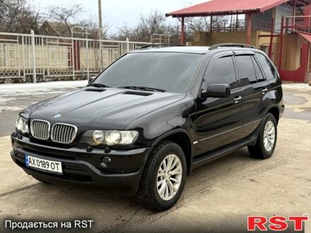 Черный БМВ Х5, объемом двигателя 4.4 л и пробегом 220 тыс. км за 7500 $, фото 1 на Automoto.ua