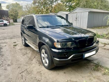 Черный БМВ Х5, объемом двигателя 4.4 л и пробегом 400 тыс. км за 7200 $, фото 1 на Automoto.ua