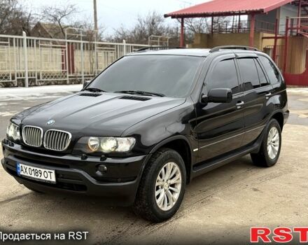 Черный БМВ Х5, объемом двигателя 4.4 л и пробегом 220 тыс. км за 7500 $, фото 1 на Automoto.ua