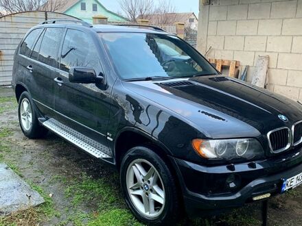 Черный БМВ Х5, объемом двигателя 3 л и пробегом 400 тыс. км за 6900 $, фото 1 на Automoto.ua