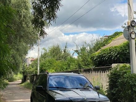 Чорний БМВ Х5, об'ємом двигуна 4.4 л та пробігом 289 тис. км за 5999 $, фото 1 на Automoto.ua