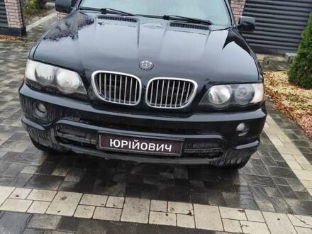 Чорний БМВ Х5, об'ємом двигуна 3 л та пробігом 400 тис. км за 7400 $, фото 1 на Automoto.ua
