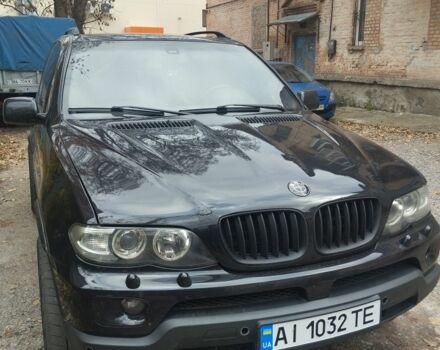 Черный БМВ Х5, объемом двигателя 4 л и пробегом 300 тыс. км за 4500 $, фото 1 на Automoto.ua