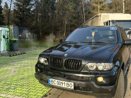 Черный БМВ Х5, объемом двигателя 4.4 л и пробегом 333 тыс. км за 9999 $, фото 1 на Automoto.ua