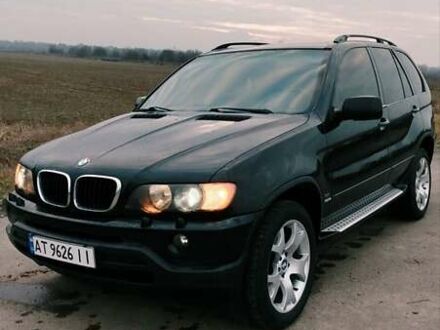Чорний БМВ Х5, об'ємом двигуна 2.93 л та пробігом 460 тис. км за 9950 $, фото 1 на Automoto.ua