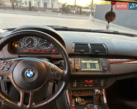 Черный БМВ Х5, объемом двигателя 4.4 л и пробегом 240 тыс. км за 8000 $, фото 1 на Automoto.ua