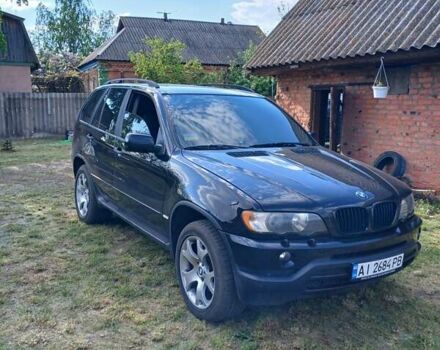 Черный БМВ Х5, объемом двигателя 3 л и пробегом 300 тыс. км за 9200 $, фото 1 на Automoto.ua