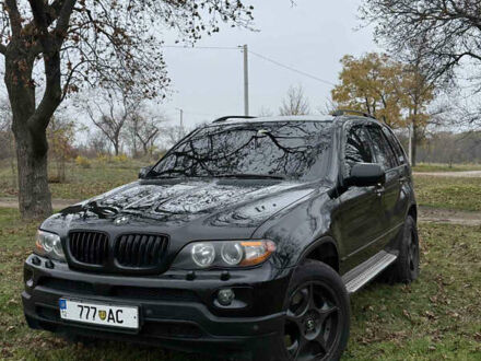 Черный БМВ Х5, объемом двигателя 2.98 л и пробегом 404 тыс. км за 9500 $, фото 1 на Automoto.ua