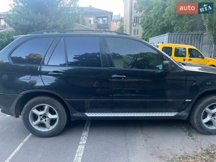 Черный БМВ Х5, объемом двигателя 3 л и пробегом 400 тыс. км за 7700 $, фото 1 на Automoto.ua