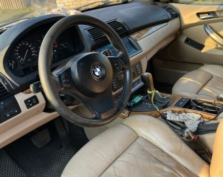 Черный БМВ Х5, объемом двигателя 3 л и пробегом 315 тыс. км за 6999 $, фото 1 на Automoto.ua