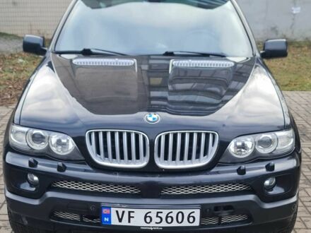 Чорний БМВ Х5, об'ємом двигуна 3 л та пробігом 300 тис. км за 7068 $, фото 1 на Automoto.ua