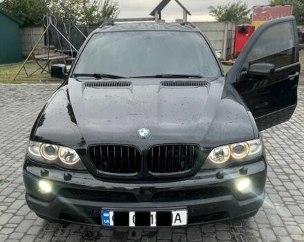 Черный БМВ Х5, объемом двигателя 3 л и пробегом 320 тыс. км за 12500 $, фото 1 на Automoto.ua