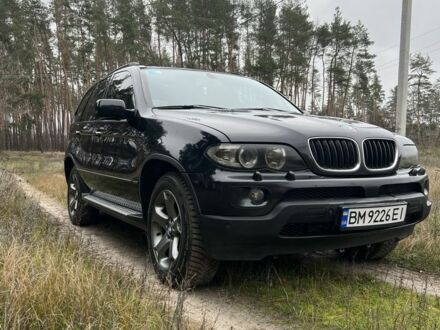 Черный БМВ Х5, объемом двигателя 3 л и пробегом 435 тыс. км за 12500 $, фото 1 на Automoto.ua