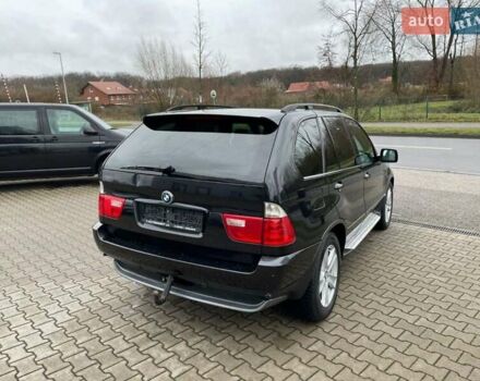 Черный БМВ Х5, объемом двигателя 3 л и пробегом 244 тыс. км за 5000 $, фото 1 на Automoto.ua