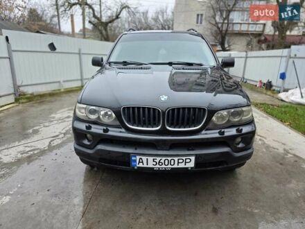 Черный БМВ Х5, объемом двигателя 4.4 л и пробегом 430 тыс. км за 6900 $, фото 1 на Automoto.ua