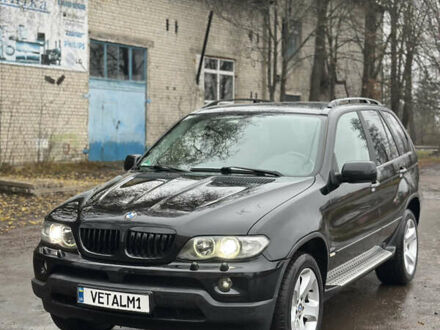 Черный БМВ Х5, объемом двигателя 3 л и пробегом 395 тыс. км за 7330 $, фото 1 на Automoto.ua