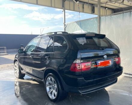 Черный БМВ Х5, объемом двигателя 3 л и пробегом 300 тыс. км за 5900 $, фото 1 на Automoto.ua