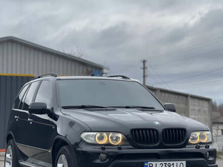 Черный БМВ Х5, объемом двигателя 4.4 л и пробегом 380 тыс. км за 8000 $, фото 1 на Automoto.ua