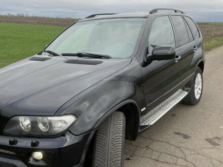 Черный БМВ Х5, объемом двигателя 2.99 л и пробегом 244 тыс. км за 12000 $, фото 1 на Automoto.ua