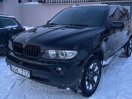 Черный БМВ Х5, объемом двигателя 3 л и пробегом 365 тыс. км за 5900 $, фото 1 на Automoto.ua