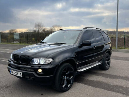 Черный БМВ Х5, объемом двигателя 3 л и пробегом 307 тыс. км за 11599 $, фото 1 на Automoto.ua
