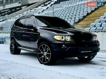Черный БМВ Х5, объемом двигателя 4.4 л и пробегом 255 тыс. км за 9900 $, фото 1 на Automoto.ua