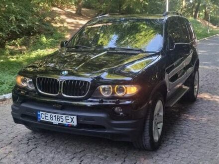 Черный БМВ Х5, объемом двигателя 4.4 л и пробегом 300 тыс. км за 9000 $, фото 1 на Automoto.ua