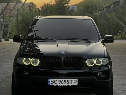 Чорний БМВ Х5, об'ємом двигуна 3 л та пробігом 315 тис. км за 11499 $, фото 1 на Automoto.ua
