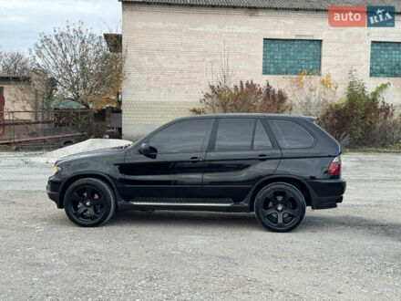Чорний БМВ Х5, об'ємом двигуна 3 л та пробігом 320 тис. км за 11999 $, фото 1 на Automoto.ua