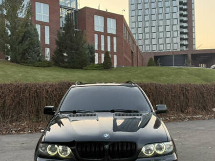 Черный БМВ Х5, объемом двигателя 3 л и пробегом 370 тыс. км за 11999 $, фото 1 на Automoto.ua