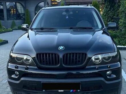 Черный БМВ Х5, объемом двигателя 3 л и пробегом 330 тыс. км за 12000 $, фото 1 на Automoto.ua