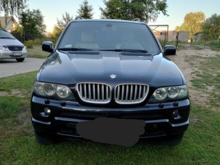 Черный БМВ Х5, объемом двигателя 3 л и пробегом 375 тыс. км за 11999 $, фото 1 на Automoto.ua