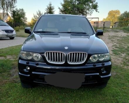 Чорний БМВ Х5, об'ємом двигуна 3 л та пробігом 375 тис. км за 11999 $, фото 1 на Automoto.ua