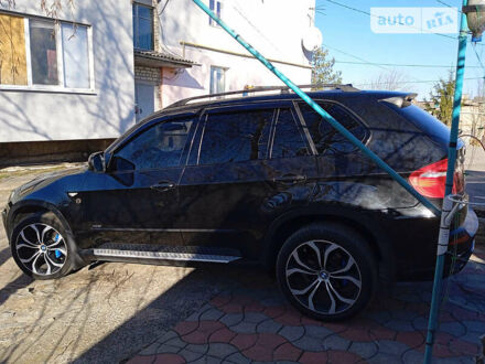 БМВ Х5 2007 у Изюме на Automoto.ua Чорний БМВ Х5, об'ємом двигуна 3 л та пробігом 287 тис. км за 12800 $, фото 1 на Automoto.ua
