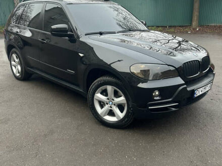 Черный БМВ Х5, объемом двигателя 3 л и пробегом 300 тыс. км за 12500 $, фото 1 на Automoto.ua