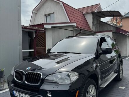 Чорний БМВ Х5, об'ємом двигуна 3 л та пробігом 234 тис. км за 12499 $, фото 1 на Automoto.ua