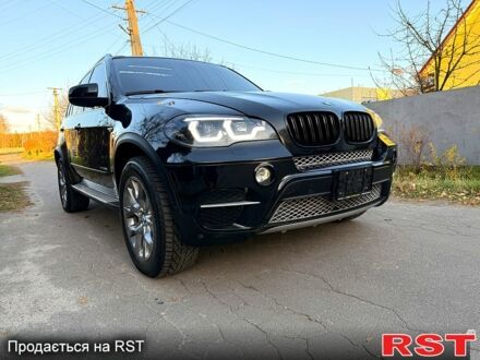 Черный БМВ Х5, объемом двигателя 3 л и пробегом 165 тыс. км за 15500 $, фото 1 на Automoto.ua