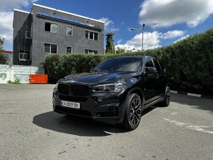 Чорний БМВ Х5, об'ємом двигуна 3 л та пробігом 198 тис. км за 28000 $, фото 1 на Automoto.ua