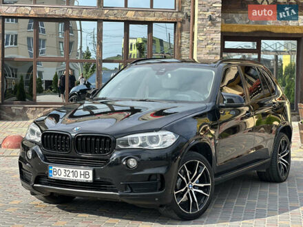 Черный БМВ Х5, объемом двигателя 2 л и пробегом 208 тыс. км за 23800 $, фото 1 на Automoto.ua